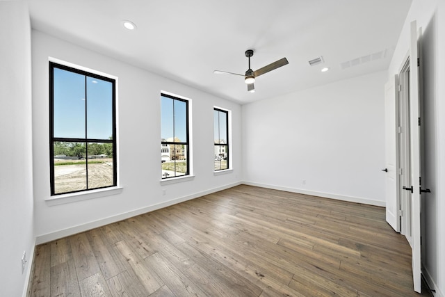 1706 Sedola Ln, Houston, TX 77055 - spare room featuring a ceiling fan, wood-type flooring, and recessed lighting