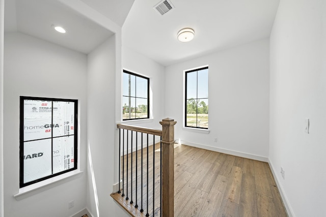 1706 Sedola Ln, Houston, TX 77055 - hall featuring an upstairs landing and light wood-style flooring
