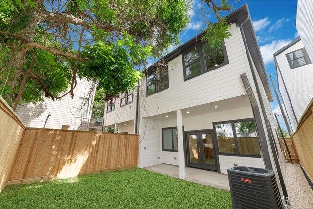 2109 Holman, Houston, TX 77004 - rear view of property with french doors and a patio area