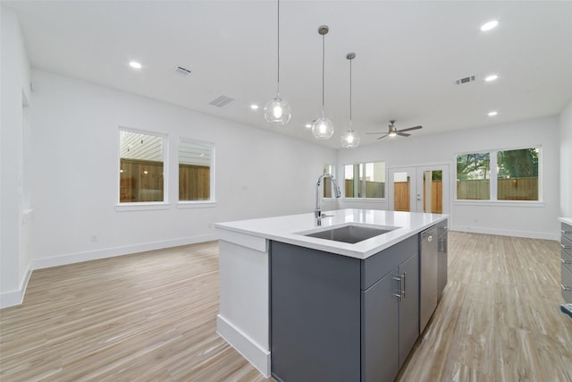 2109 Holman, Houston, TX 77004 - kitchen with open floor plan, dishwasher, light countertops, a ceiling fan, and an island with sink