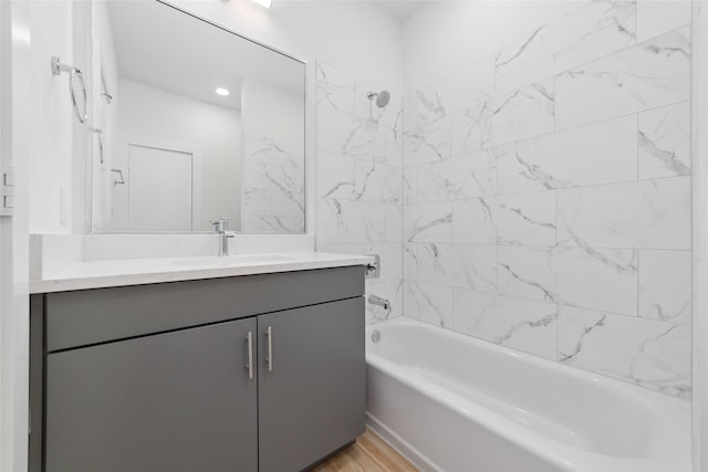 2109 Holman, Houston, TX 77004 - full bathroom featuring vanity, shower / tub combination, and wood finished floors