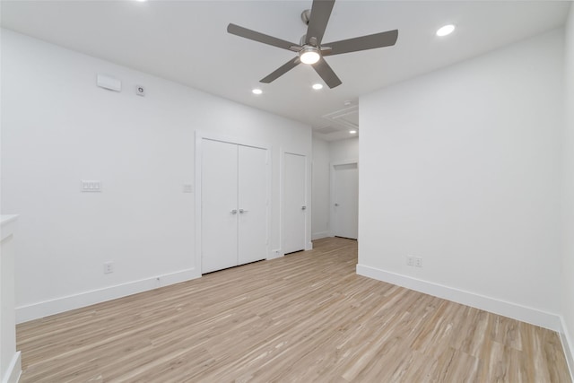 2109 Holman, Houston, TX 77004 - unfurnished bedroom featuring light wood finished floors, attic access, recessed lighting, multiple closets, and ceiling fan