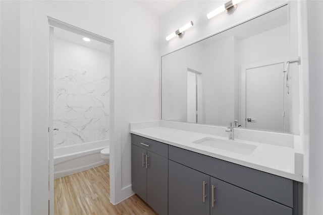 2109 Holman, Houston, TX 77004 - full bath with vanity, wood finished floors, and bathing tub / shower combination