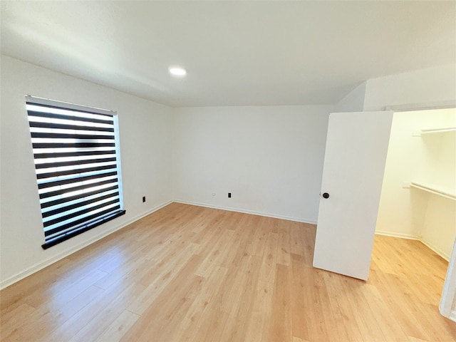 9090 S Braeswood Blvd Unit 115, Houston, TX 77074 - spare room featuring wood finished floors and recessed lighting