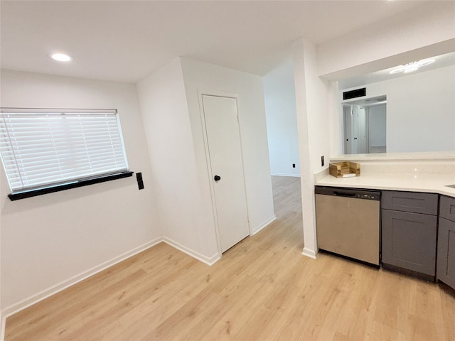 9090 S Braeswood Blvd Unit 115, Houston, TX 77074 - kitchen with stainless steel dishwasher, gray cabinetry, light wood-style flooring, light countertops, and recessed lighting
