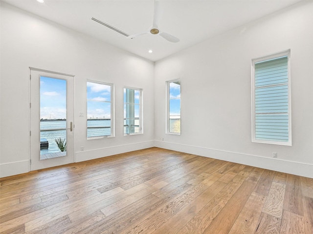 430 81st St, Galveston, TX 77554 - spare room featuring light wood finished floors, ceiling fan, and recessed lighting