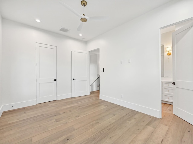 430 81st St, Galveston, TX 77554 - unfurnished bedroom with light wood finished floors, recessed lighting, ensuite bathroom, and ceiling fan