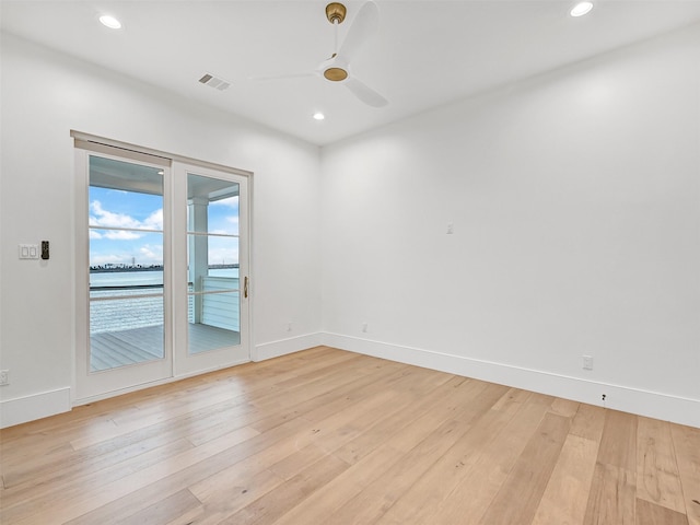 430 81st St, Galveston, TX 77554 - empty room featuring a ceiling fan, light wood-style floors, and recessed lighting