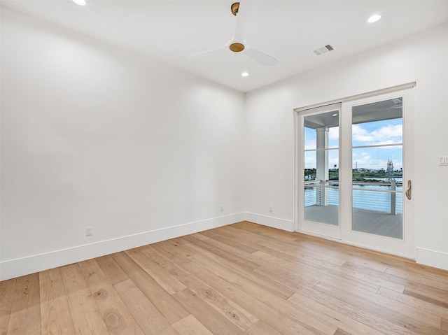 430 81st St, Galveston, TX 77554 - empty room with light wood-style floors, a ceiling fan, and recessed lighting