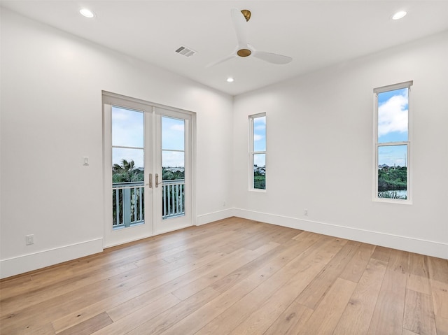 430 81st St, Galveston, TX 77554 - unfurnished room with a ceiling fan, french doors, light wood finished floors, and recessed lighting