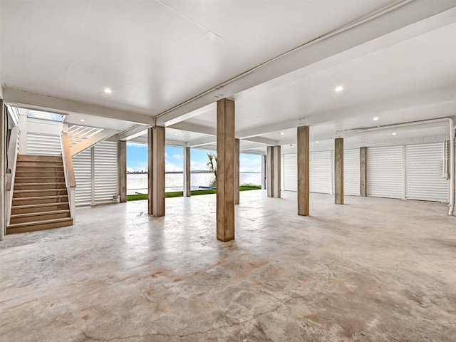430 81st St, Galveston, TX 77554 - garage featuring a water view and recessed lighting