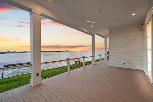 430 81st St, Galveston, TX 77554 - deck at dusk with a water view and ceiling fan