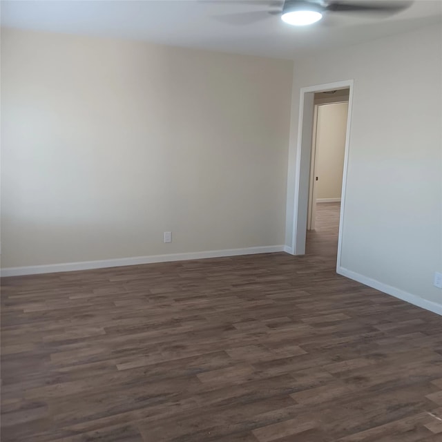 7924 Elvera St, Houston, TX 77012 - empty room featuring a ceiling fan and dark wood-type flooring