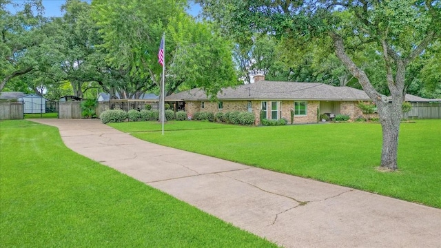 3220 Patricia Ln, Pearland, TX 77581 - ranch-style house with a chimney and brick siding