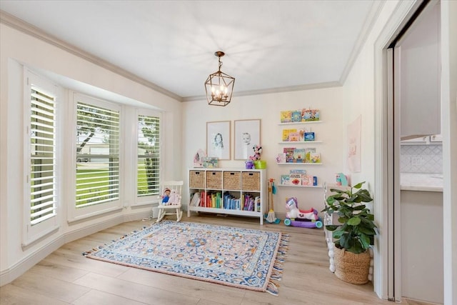 3220 Patricia Ln, Pearland, TX 77581 - rec room with ornamental molding, a chandelier, and wood finished floors