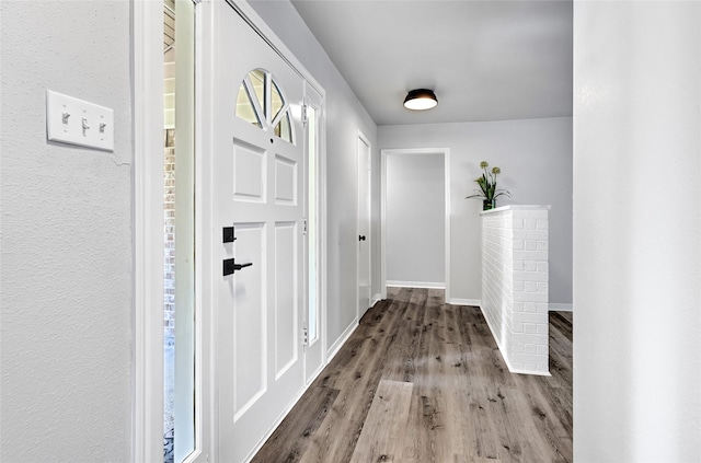 28207 Nancy Ln, Conroe, TX 77385 - hallway with wood finished floors and baseboards