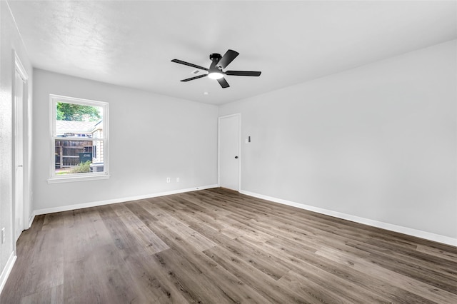 28207 Nancy Ln, Conroe, TX 77385 - spare room with wood finished floors and ceiling fan