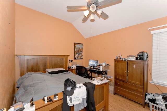 20710 Wagon Bridge Ln, Cypress, TX 77433 - bedroom with lofted ceiling, light wood-style floors, and a ceiling fan