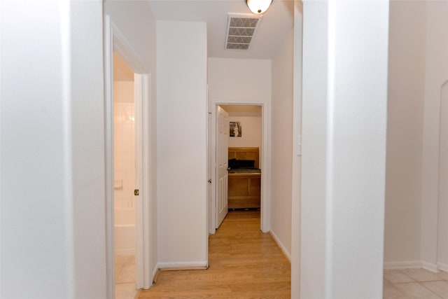 20710 Wagon Bridge Ln, Cypress, TX 77433 - hall with light wood-style flooring and baseboards