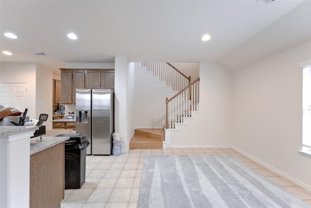 20710 Wagon Bridge Ln, Cypress, TX 77433 - kitchen featuring stainless steel fridge, light tile patterned flooring, and recessed lighting