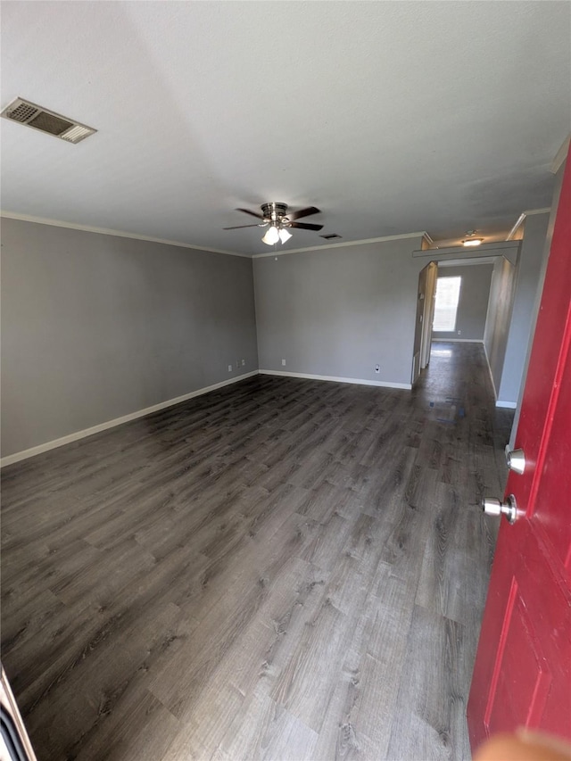 21402 Berry Ridge Ln, Tomball, TX 77375 - empty room with crown molding, dark wood-style flooring, and a ceiling fan