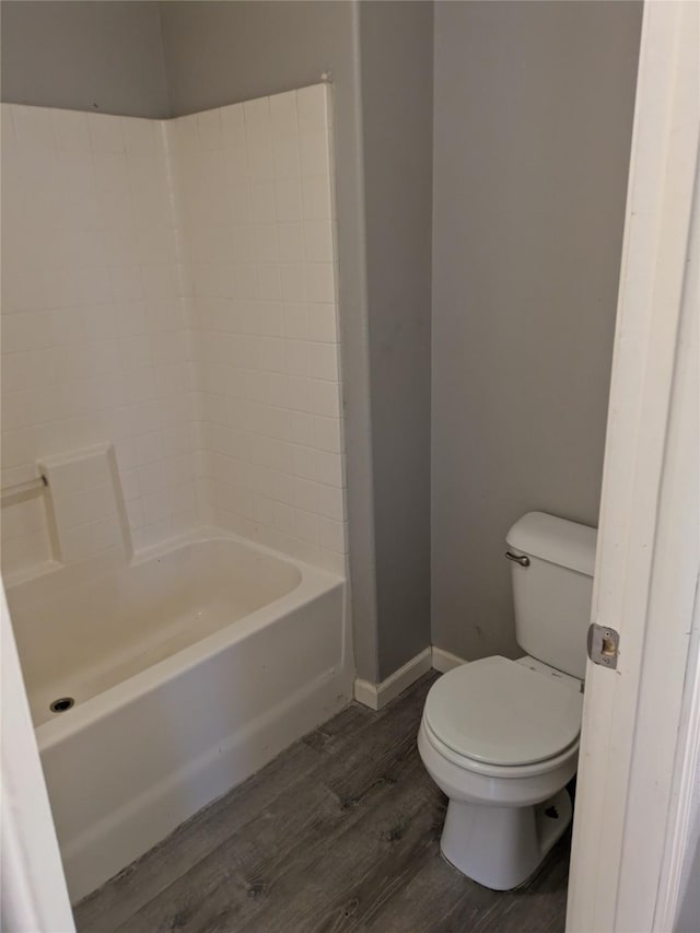 21402 Berry Ridge Ln, Tomball, TX 77375 - bathroom with wood finished floors and toilet
