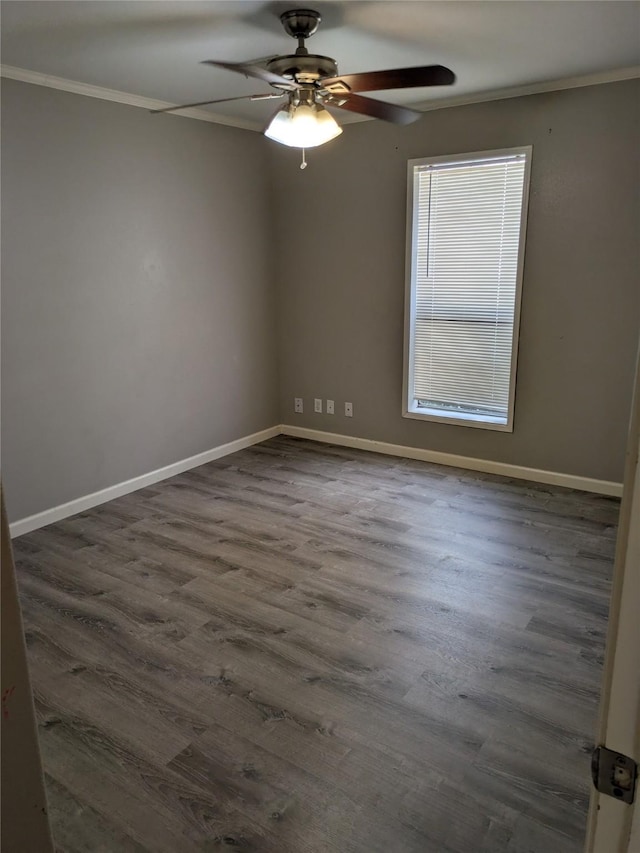 21402 Berry Ridge Ln, Tomball, TX 77375 - empty room with crown molding, a ceiling fan, and dark wood-style flooring