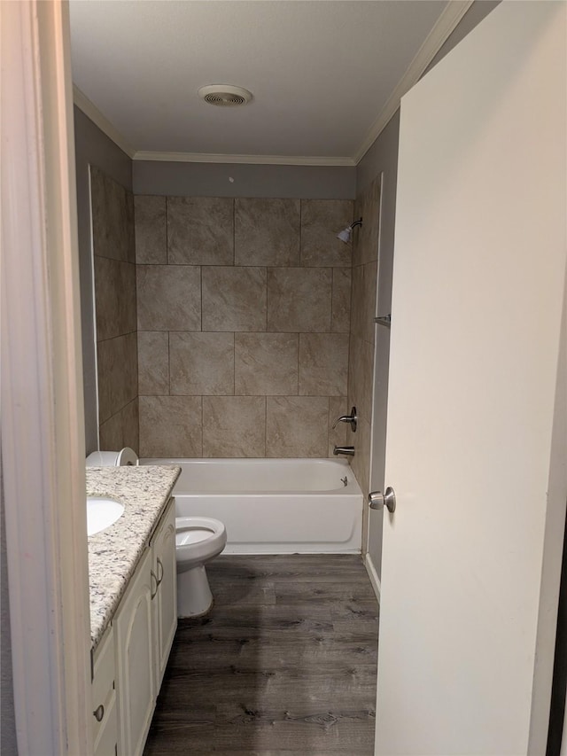 21402 Berry Ridge Ln, Tomball, TX 77375 - bathroom featuring vanity, wood finished floors, ornamental molding, and shower / bath combination