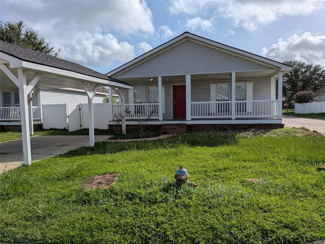 21402 Berry Ridge Ln, Tomball, TX 77375 - view of front of house featuring covered porch and a carport
