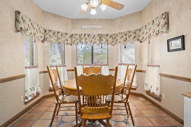 215 Enchanted Estates Dr, Crockett, TX 75835 - dining space featuring a textured wall and ceiling fan