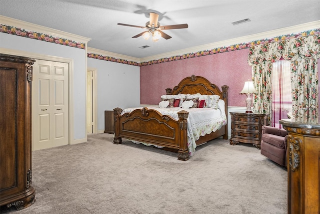 215 Enchanted Estates Dr, Crockett, TX 75835 - bedroom with crown molding, carpet floors, and a ceiling fan