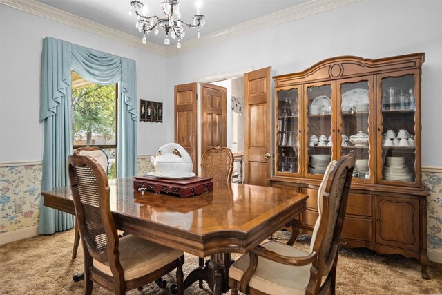 215 Enchanted Estates Dr, Crockett, TX 75835 - dining space featuring a chandelier, light carpet, and crown molding