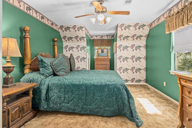 215 Enchanted Estates Dr, Crockett, TX 75835 - bedroom featuring carpet floors, ceiling fan, and wallpapered walls