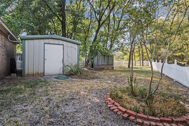 215 Enchanted Estates Dr, Crockett, TX 75835 - fenced backyard with a shed