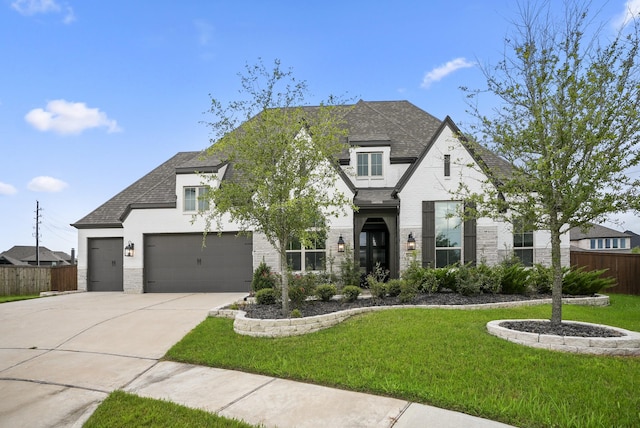 2603 Merlin Way, Katy, TX 77493 - french country home with driveway, roof with shingles, brick siding, and a garage