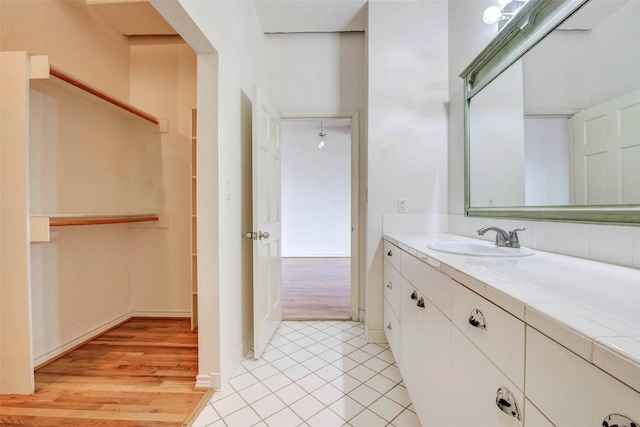 201 Main St Unit 5D, Houston, TX 77002 - bathroom featuring vanity and tile patterned floors