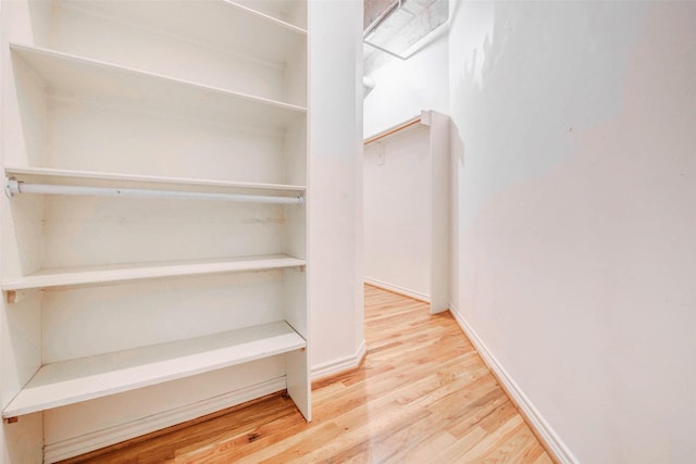 201 Main St Unit 5D, Houston, TX 77002 - spacious closet with wood finished floors