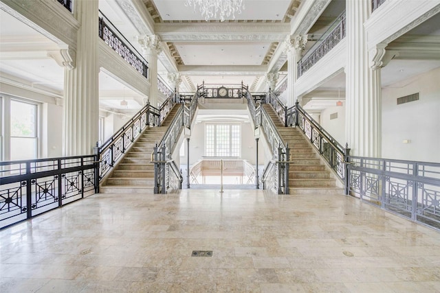 201 Main St Unit 5D, Houston, TX 77002 - lobby featuring stairs, ornamental molding, and a towering ceiling