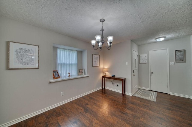 16223 White Star Dr, Houston, TX 77062 - foyer with wood finished floors, a chandelier, and a textured ceiling