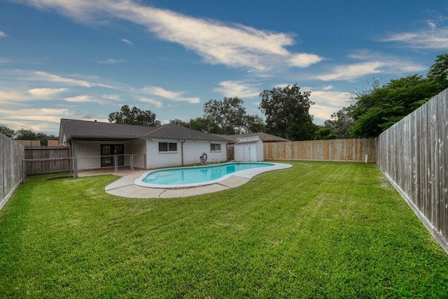 16223 White Star Dr, Houston, TX 77062 - view of pool featuring a fenced backyard, a patio area, and a storage shed