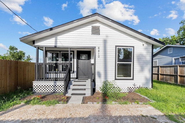 6810 Cohn St, Houston, TX 77091 - shotgun-style home with a porch