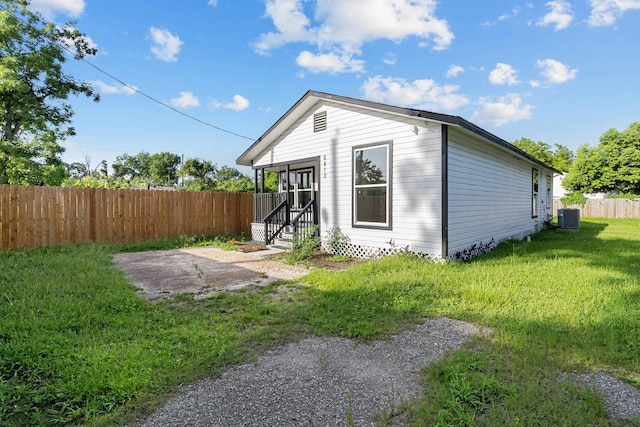 6810 Cohn St, Houston, TX 77091 - rear view of house featuring entry steps and a patio