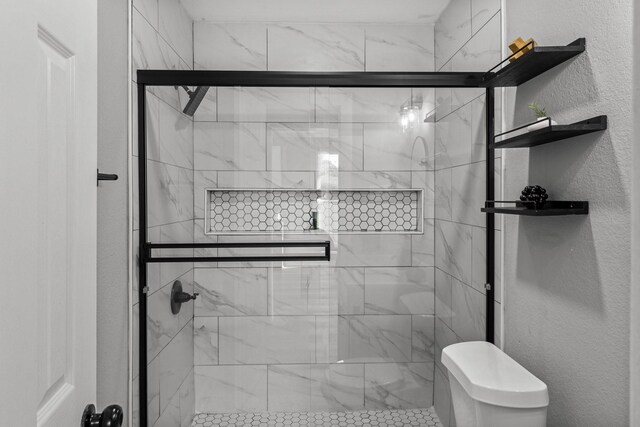6810 Cohn St, Houston, TX 77091 - bathroom featuring a shower stall and a textured wall