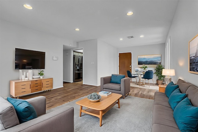 6437 Bayou Glen Rd, Houston, TX 77057 - living area with wood finished floors and recessed lighting