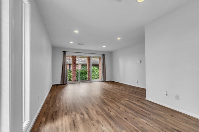 6437 Bayou Glen Rd, Houston, TX 77057 - spare room featuring recessed lighting and wood finished floors