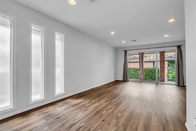 6437 Bayou Glen Rd, Houston, TX 77057 - spare room featuring wood finished floors and recessed lighting