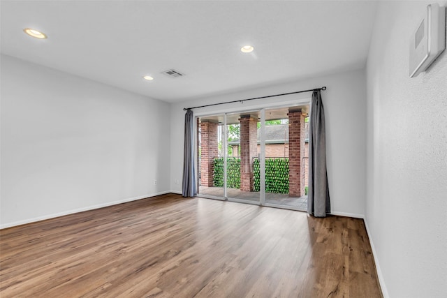 6437 Bayou Glen Rd, Houston, TX 77057 - spare room featuring wood finished floors and recessed lighting