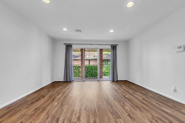 6437 Bayou Glen Rd, Houston, TX 77057 - spare room featuring wood finished floors and recessed lighting