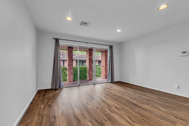 6437 Bayou Glen Rd, Houston, TX 77057 - spare room featuring wood finished floors and recessed lighting