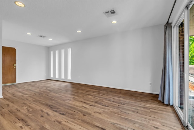 6437 Bayou Glen Rd, Houston, TX 77057 - empty room featuring wood finished floors and recessed lighting